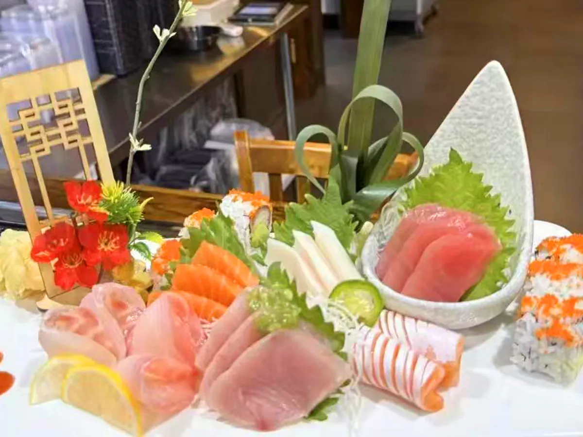 Colorful sushi and sashimi platter with garnishes at Extreme Japanese Restaurant in DuBois