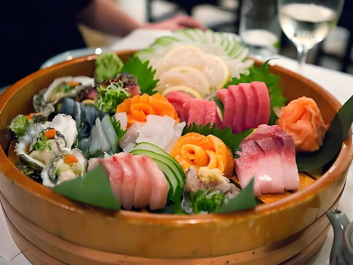 Vibrant sashimi platter in a traditional wooden tub at Extreme Japanese Restaurant in DuBois